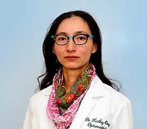 Dr. Kathy L. Ong, OD, in her white coat